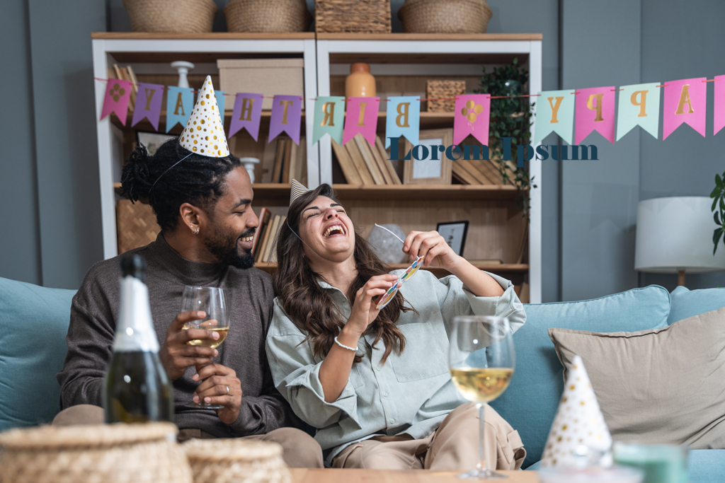 Happy couple celebrating a birthday at home with party hats and decorations. Enjoy a fun and memorable birthday party with rentals in Wilmington, DE.