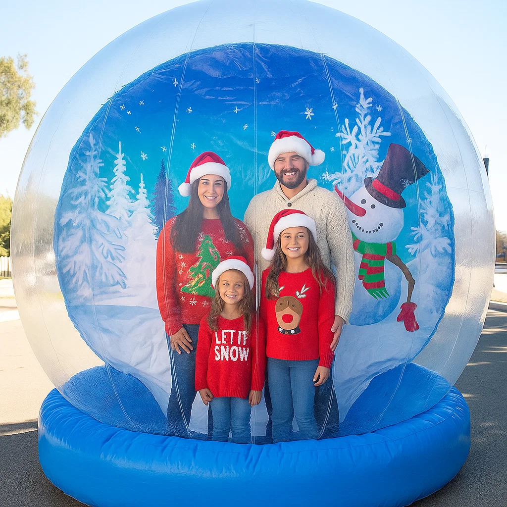 giant inflatable snow globe rental guests posing for photos at holiday party by Party Pros East Coast