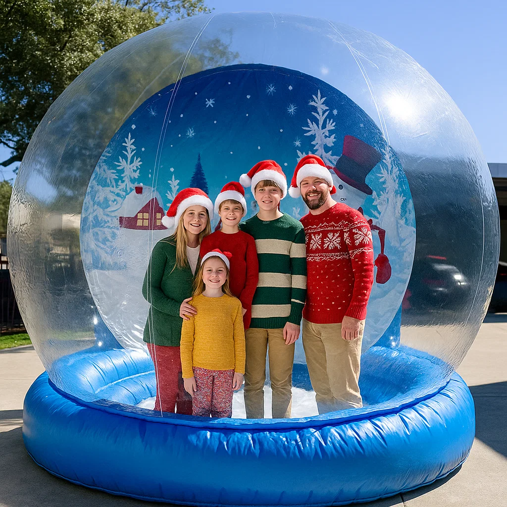 giant inflatable snow globe rental with branded backdrop inside for town tree lighting — branded backdrop inside