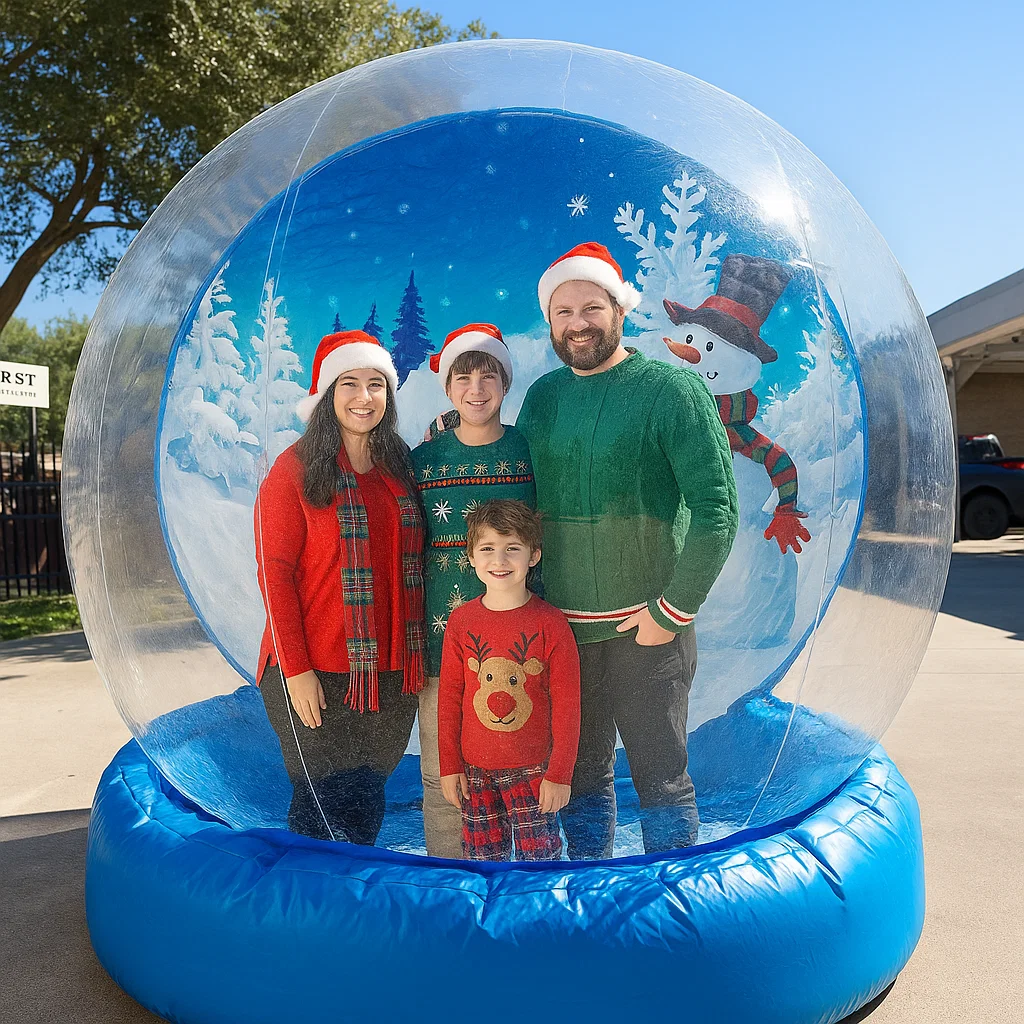 interactive snow globe photo experience for employee appreciation night — outdoor setup under tent
