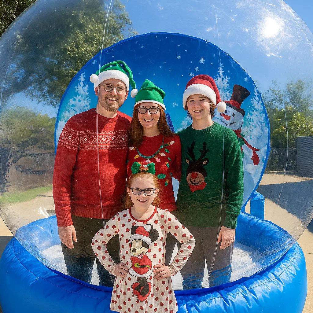 Guests enjoy snow globe photo booth rental at New Year celebration by Party Pros East Coast — clean queue management