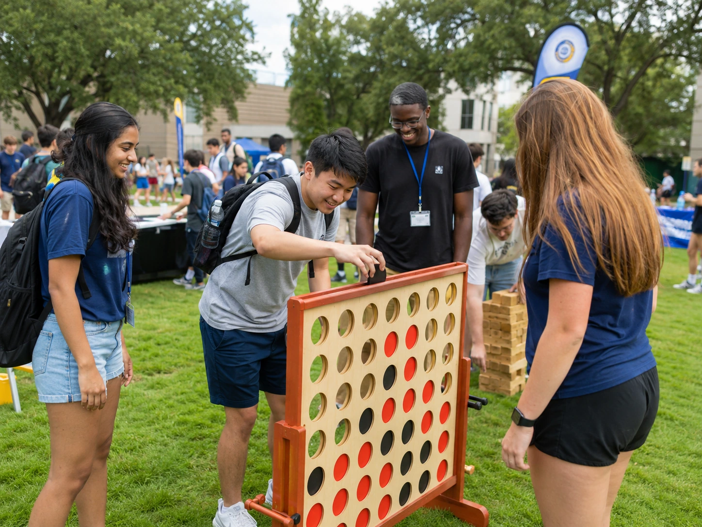 College orientation activities with students playing giant lawn games