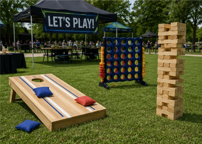 Company picnic lawn games stations with cornhole and giant games