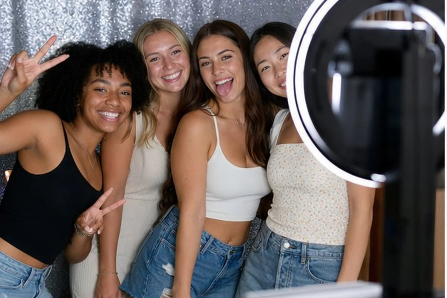 Students using a 360 video photo booth during a Blue Bell campus activities event