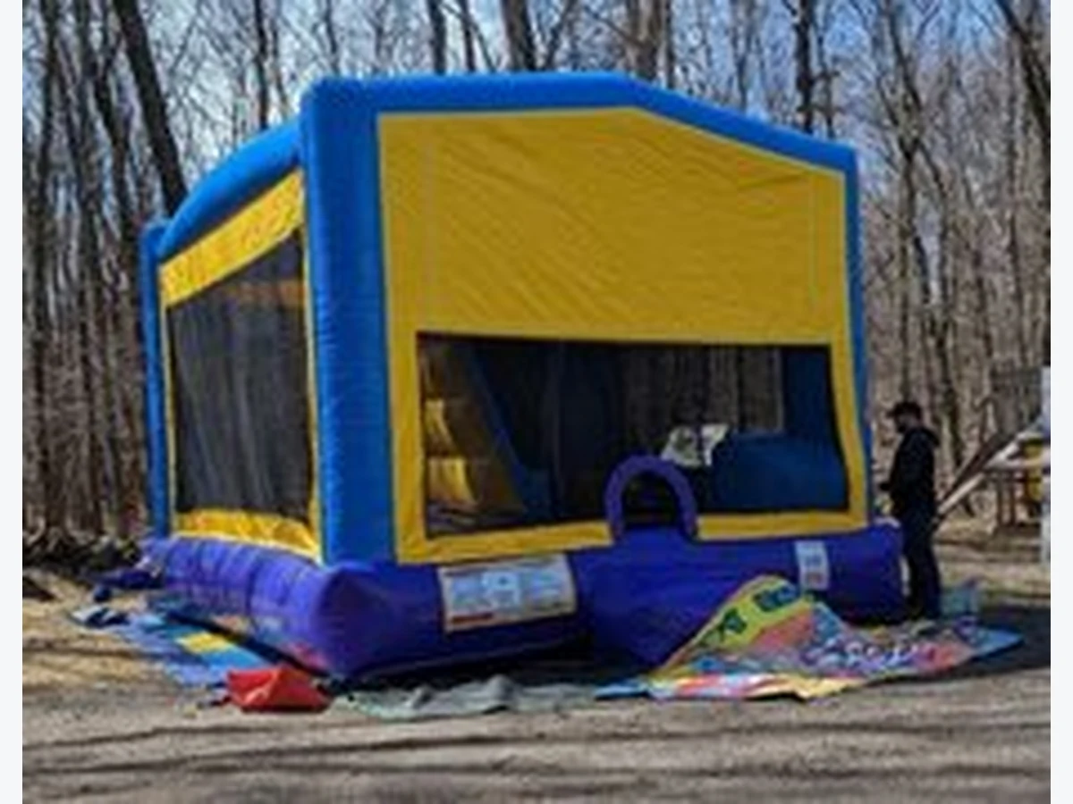 Blue combo with slide on the inside bounce house rentals option for Waterbury, CT