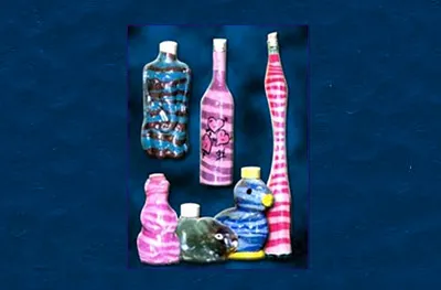 Layered sand art bottles from a Party Pros East Coast craft station