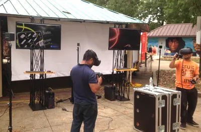 Guest playing a virtual reality game at a Party Pros East Coast event