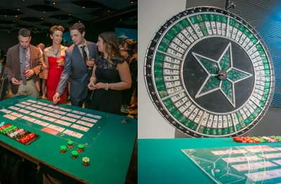 Guests at a money wheel betting layout beside the big spinning money wheel at a casino night